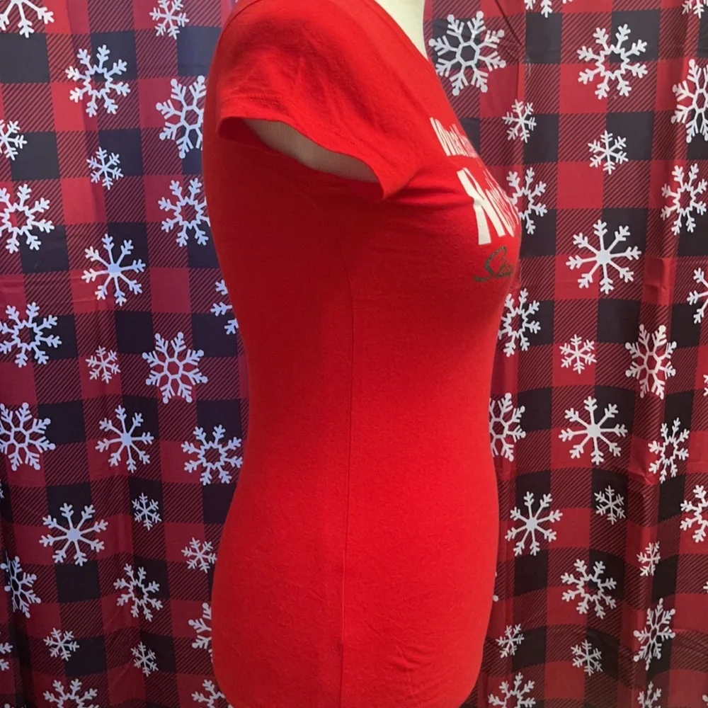 What happens in the North Pole stays in the North Pole Christmas Shirt. Size SM - Picture 4 of 6